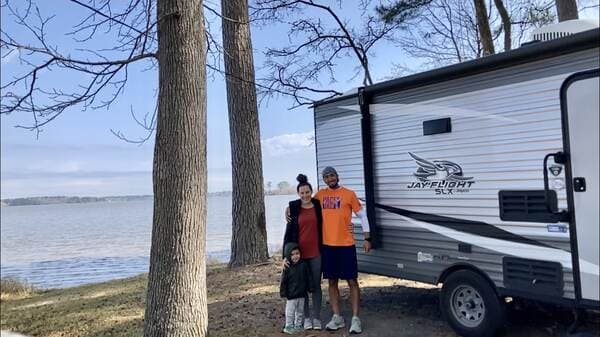 Family by lake