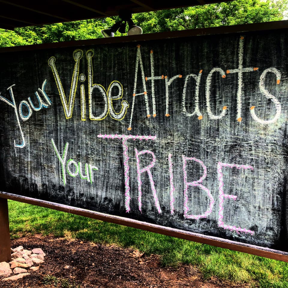 vibe tribe chalkboard sign
